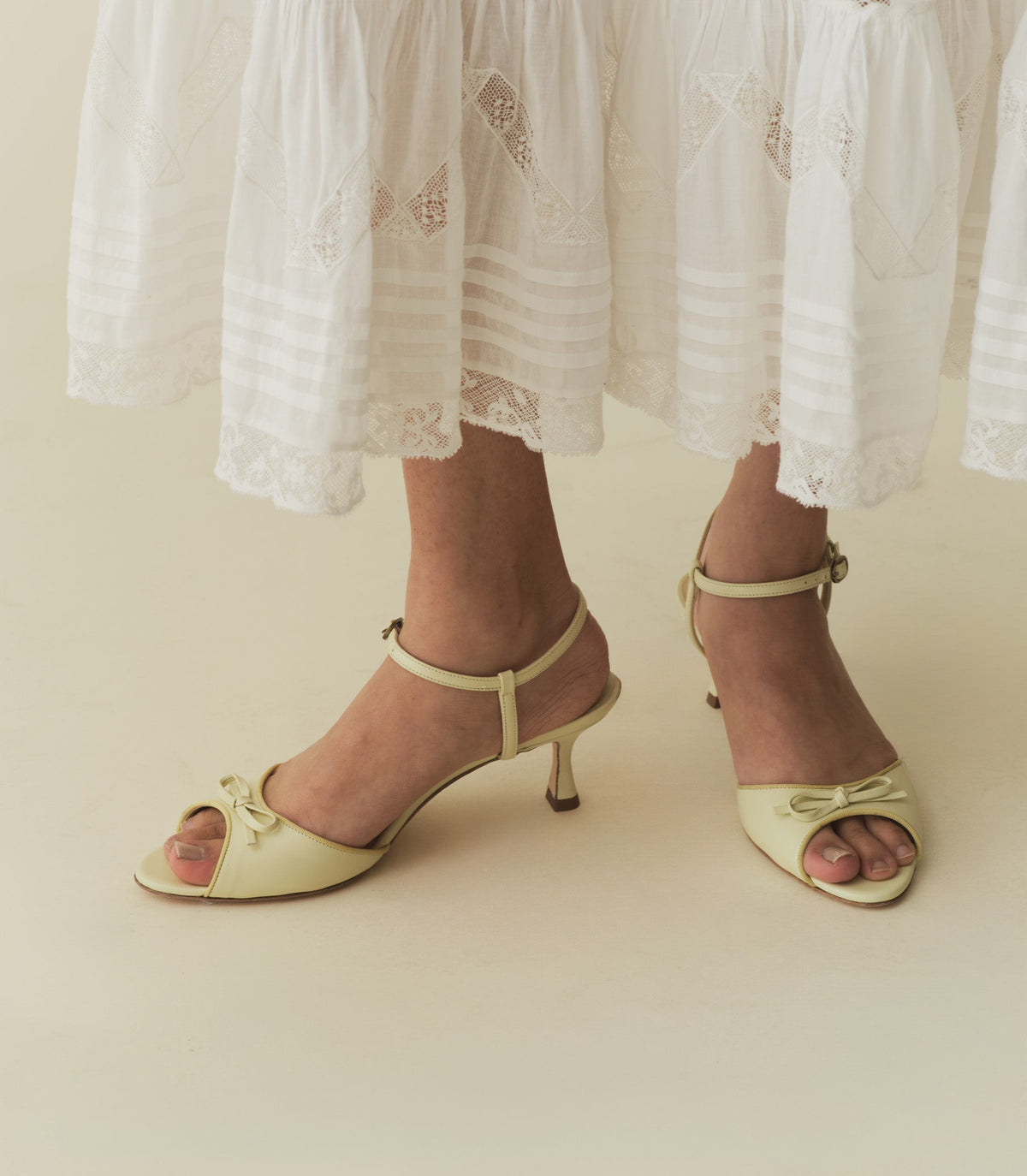 ARIANNA PEEP TOE HEEL -- LEMON CHIFFON NAPPA | SPRING 24